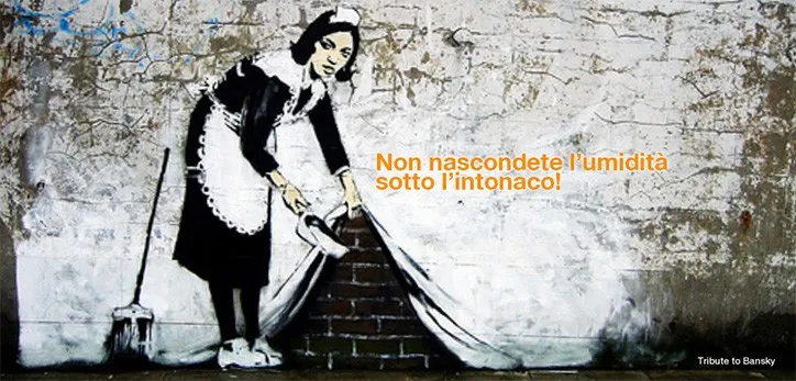 Murales con una pulitrice che alza l'intonaco di un muro, su cui si legge: non nascondete l'umidita di risalita sotto l'intonaco